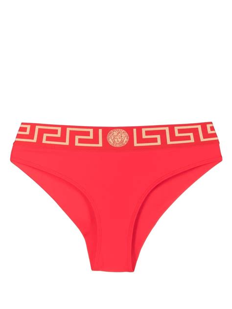 Greca Border bikini bottoms in red .